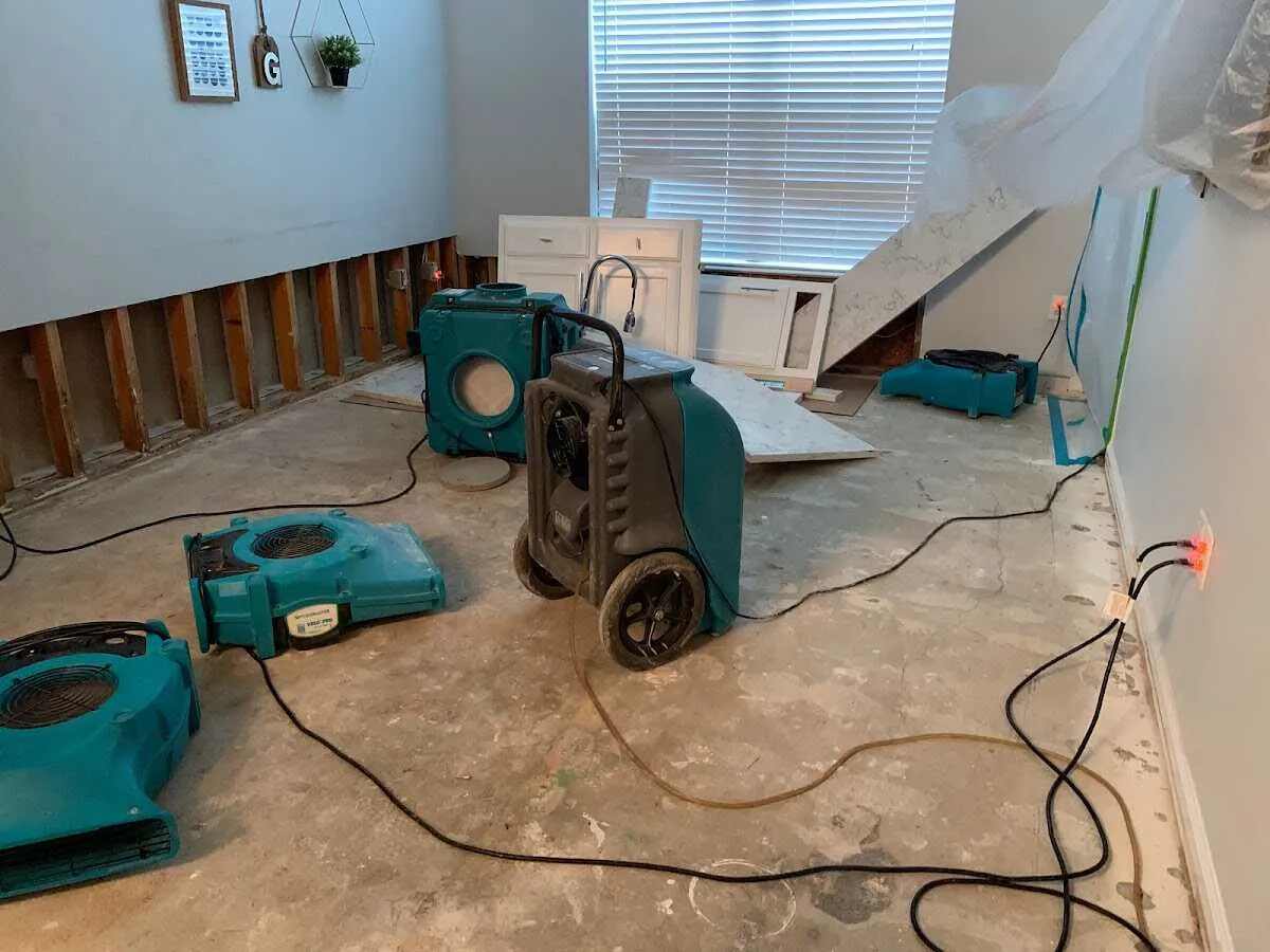 Dehumidifier in flood-cut room for Water Damage Restoration in Aiea